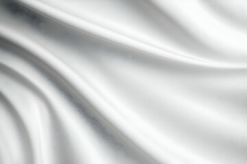Fototapeta premium Elegant white fabric texture with flowing patterns, perfect for backgrounds or designs, conveying softness and luxury.