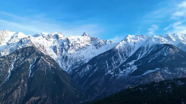 Aerial drone shot capturing the stunning landscapes of Kalpa with Kinner Kailash in the background, Himachal Pradesh.