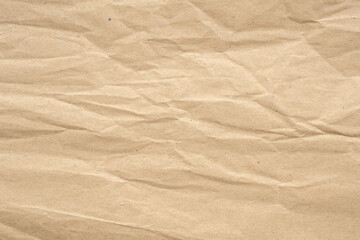 Abstract crumpled and creased recycle brown paper texture background