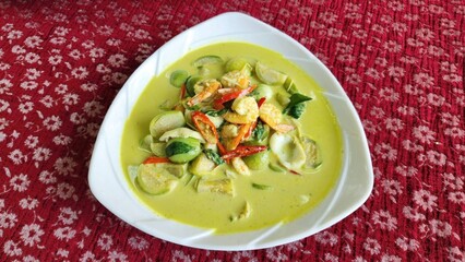 Thai Green Curry with Shrimp. Thai Food. Exotic Seafood Curry with Vibrant Vegetables and Spices.