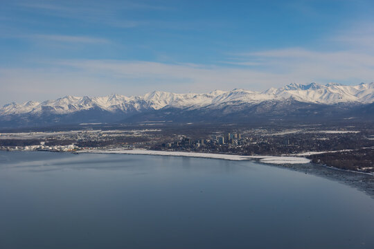 Aerial view of the coastal city of Anchorage, Alaska, on a winter morning.