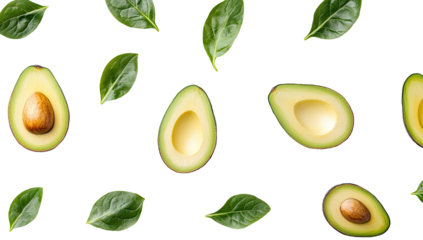 Fresh avocado halves with green leaves