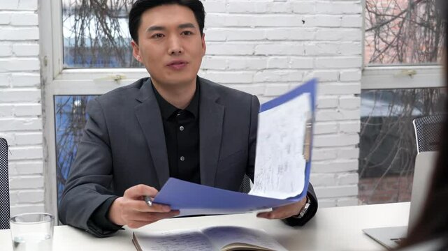 In modern building, businessman businesswoman at office meeting male employer reject business offer decline financial documents, refuse to unemployed client no answer job interview negative decision