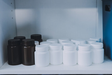 Pharmacy shelves, medicine bottles, sunlight, healthcare