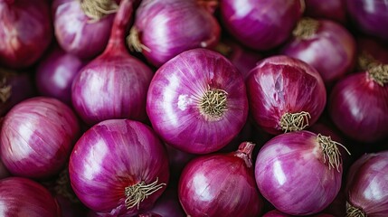 Close-up of many fresh red onions.