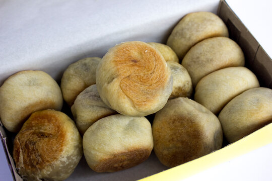 Bakpia pathok , Indonesian Traditional Cake with Chinese Influence. It made from a mixture of green beans, cheese and sugar, which is wrapped in flour, then baked.
