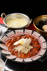 Stir-fried octopus and pork belly and Korean side dishes
