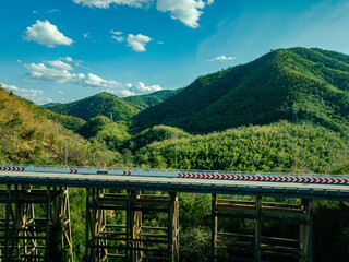 Fototapeta premium Pho Khun Pha Mueang Bridge or Huai Tong Bridge It is a natural view point. .From Lom Sak District up to Nam Nao District, .Phetchabun Province It holds the bridge with the highest pier in the country