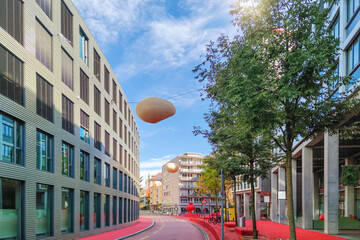 Modern architecture meets art in sunny St. Gallen, Switzerland, showcasing Raiffeisenplatz's...
