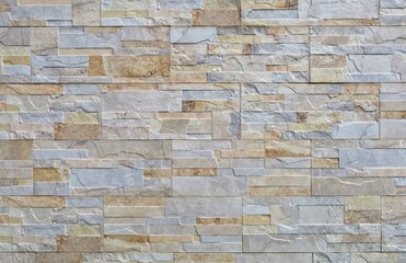 Stoneware paneling wall with stone effect. Colors are gray and shades of brown. External  decor...