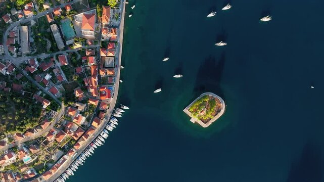 Aerial view of a small Greek island of Lazareto near Vathy in Ithaca, Sailing boats in harbour