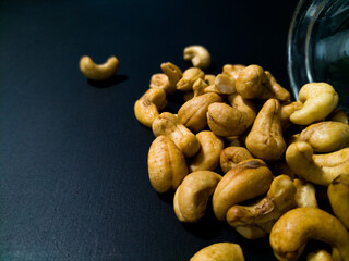 cashew nuts on black background