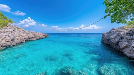 Fototapeta premium Caribbean Cove Rope Swing Vibrant tropical style High-definition bright sunlight Landscape wide view Clear turquoise water Relaxing paradise scene Azure blue hues Perfect travel brochure