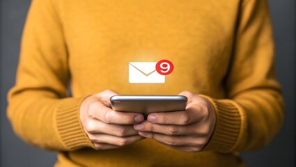 Close-up of person holding smartphone with unread messages. Mobile notification alert with red envelope icon. Modern communication technology in focus.
