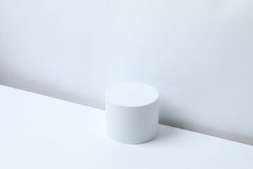 White podium on a light background