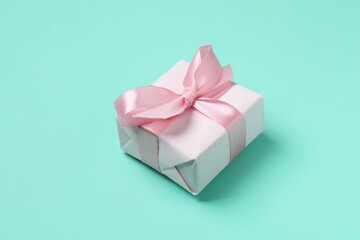 Beautiful gift box on color background
