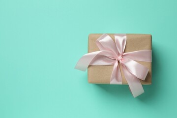 Beautiful gift box on color background