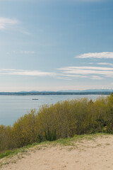 landscape with Puget Sound on sunny day at Discovery Park, Seattle, Washington