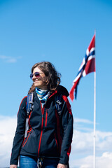female tourist with norwegian flag
