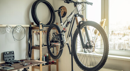 Mountain bike in the repair shop at the stand. Concept of preparation for the new season, repair and maintenance