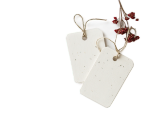 Recycled paper gift tags with embedded wildflower seeds, attached to hemp twine, eco-friendly packaging on white background