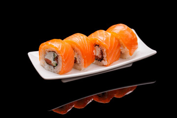 Sushi maki beautifully arranged on plate © evgeeenius