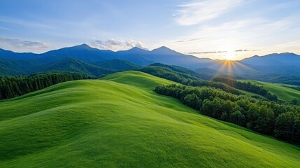 Fototapeta premium Serene Landscape with Rolling Green Hills and Majestic Mountains