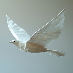 White origami bird flying right