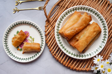 Fried spring rolls or Popiah Goreng, crispy fried spring roll filled with vegetables, meat or...