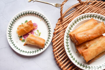 Fried spring rolls or Popiah Goreng, crispy fried spring roll filled with vegetables, meat or prawns, offering a crunchy delight. Usually served for breakfast or afternoon tea.