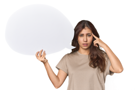 Middle Eastern woman holding comic bubble showing a disappointment gesture with forefinger.