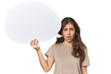 Middle Eastern woman holding comic bubble screaming very angry and aggressive.