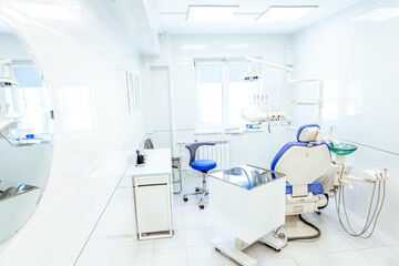 Dentist Office interior in white colors. Dentist's Chair.