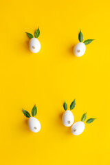 Frame of Easter bunny made of eggs and willow buds. Happy Easter concept