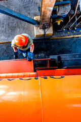 Gas or oil truck and worker top view. Industrial transportation concept