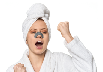 Young Caucasian redhead with pore strip raising fist after a victory, winner concept.