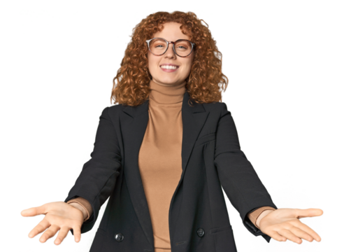 Young Caucasian redhead in business attire showing a welcome expression.