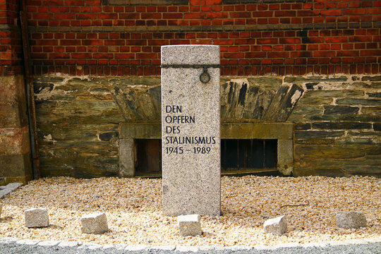 Stollberg, Germany - April 6, 2025: To the victims of Stalinism, a memorial stone in front of the former GDR women's prison in Hoheneck, Stollberg, Saxony.