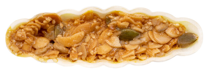 Caramel peanut slices snack with almond slices, melon seeds, sesame seeds, caramel syrup, white sugar and mix nut isolate on white PNG file.