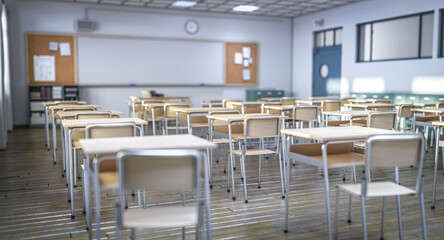 Empty classroom with wooden school desks and chairs is waiting for students to come back to school