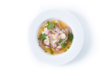 Traditional Peruvian ceviche sea bass fillet isolated on white background. Top view