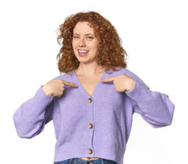 Young Caucasian redhead woman surprised pointing with finger, smiling broadly.
