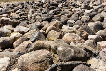 Large boulders in the sun as background