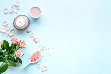 Beauty routine concept - skin care cosmetic with roses essential oil