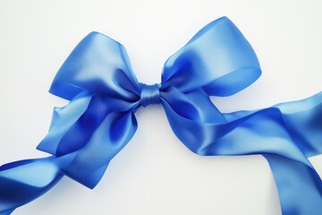 Naklejka premium Bright blue satin ribbon arranged in a decorative bow on a white background perfect for gifts or crafts