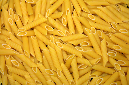 penne makarna - uncooked italian penne pasta background