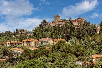 The picturesque town of Montecatini Terme with its hillside houses and ancient castle. Montecatini Terme is a spa resort in the province of Pistoia in the Italian region of Tuscany.