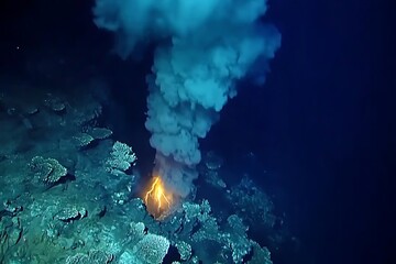 Deep ocean hydrothermal vent erupting hot mineral water, undersea volcanic activity, background