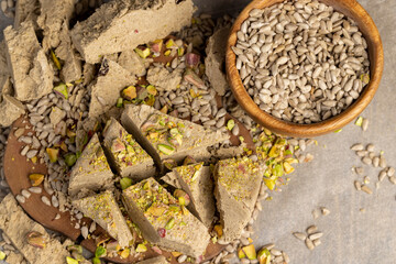 halva made from roasted sunflower seeds and crushed into one mass, a sweet delicious dessert made from fried sunflower seeds, top view