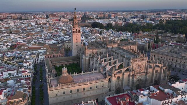 Cathedral of Seville, Aerial of the gothic Building with its famous Giralda bell tower in old town in Andalusia, Spain.